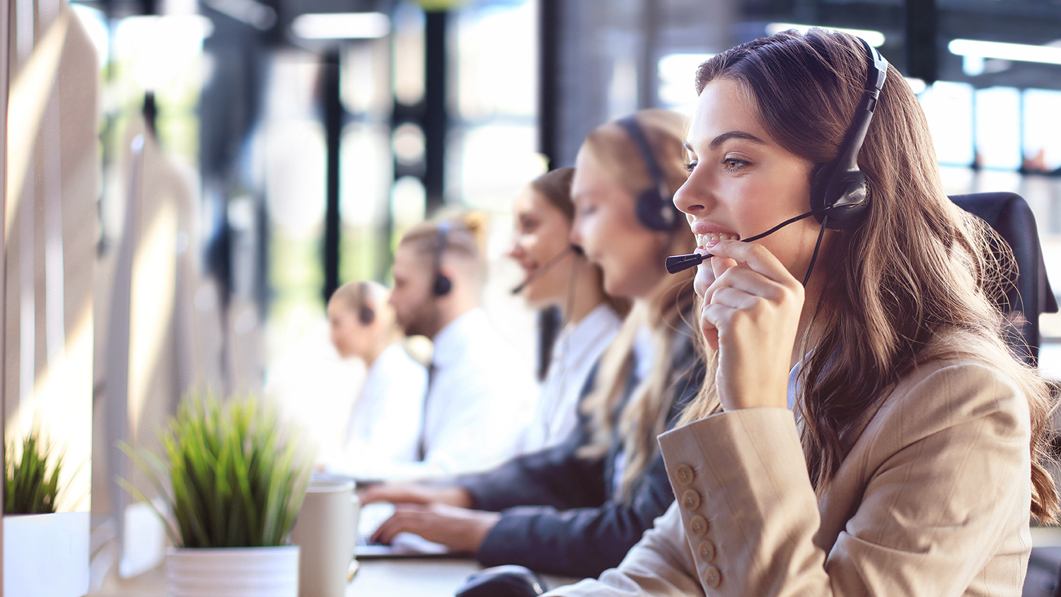 Additional Services for E-shops - Call center services - view of call center location, people on the phone with headsets